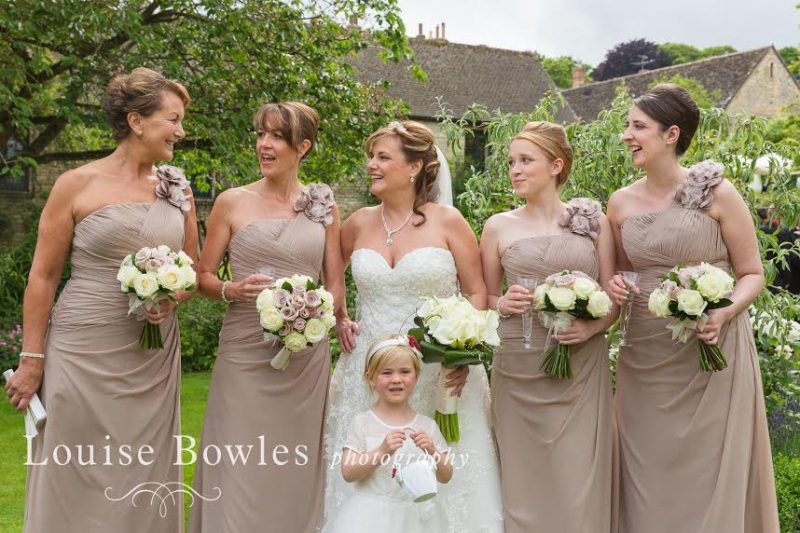 A female showcases the her wedding hair style from behind